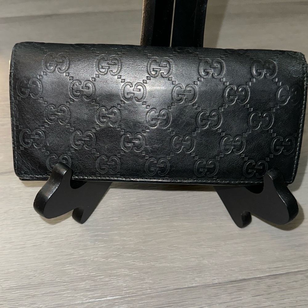 Black Gucci, leather authentic, long,flap wallet